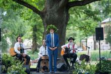 RSU and LASE colleagues celebrate Midsummer by the big oak tree in Inspiration Park